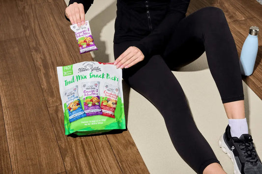 Healthy Trail Mix Snack Packs featuring Cranberry Health Mix, Omega-3 Deluxe Mix, and Heart Healthy Mix with nuts, seeds, and dried fruits.