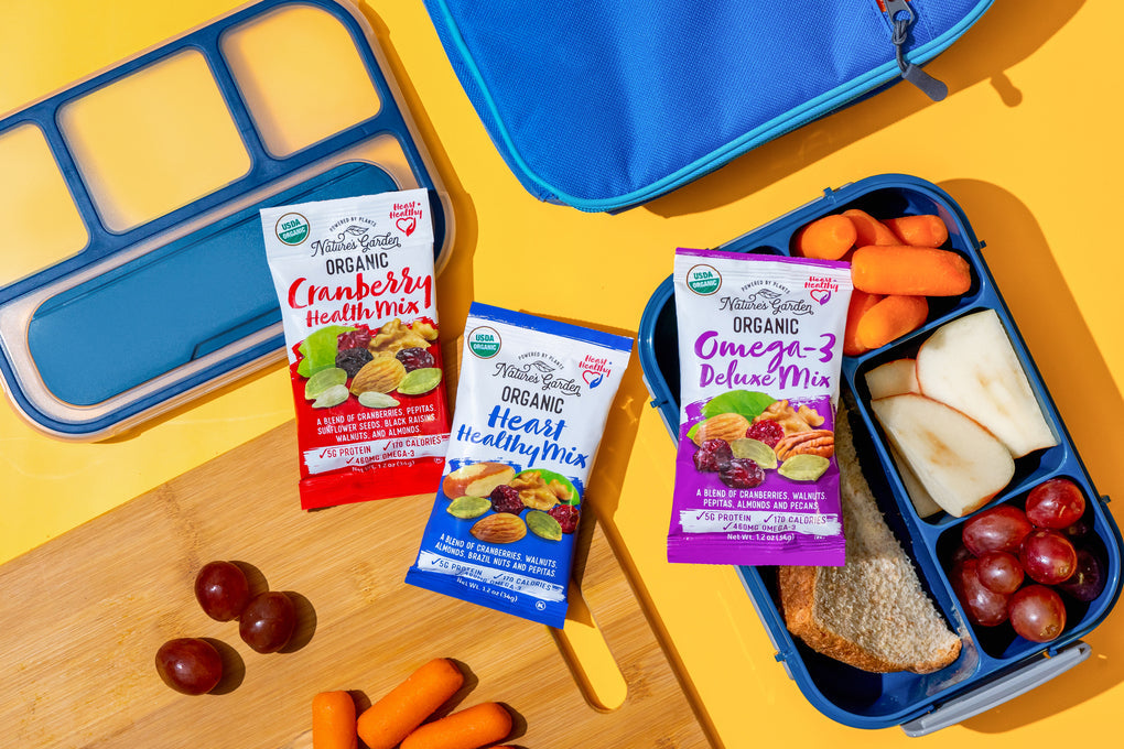 Nature’s Garden organic trail mix snack packs with lunchbox fruits and veggies, perfect for school snacks or on-the-go energy.