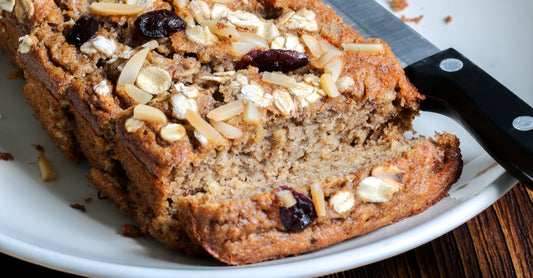Flourless Banana Bread Garnished with Organic Banana Chips and Trail Mix