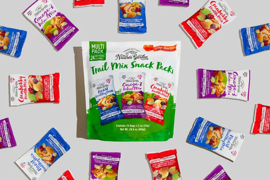 Nature’s Garden Heart Healthy Trail Mix Snack Packs multipack featuring cranberry, omega-3, and heart healthy mix on green background.