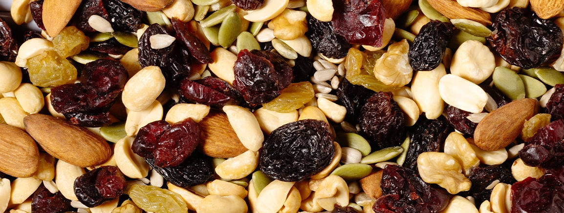 Cranberry Health Mix ingredients: cranberries, black raisins, walnuts, almonds, pepitas, sunflower seeds, and golden raisins